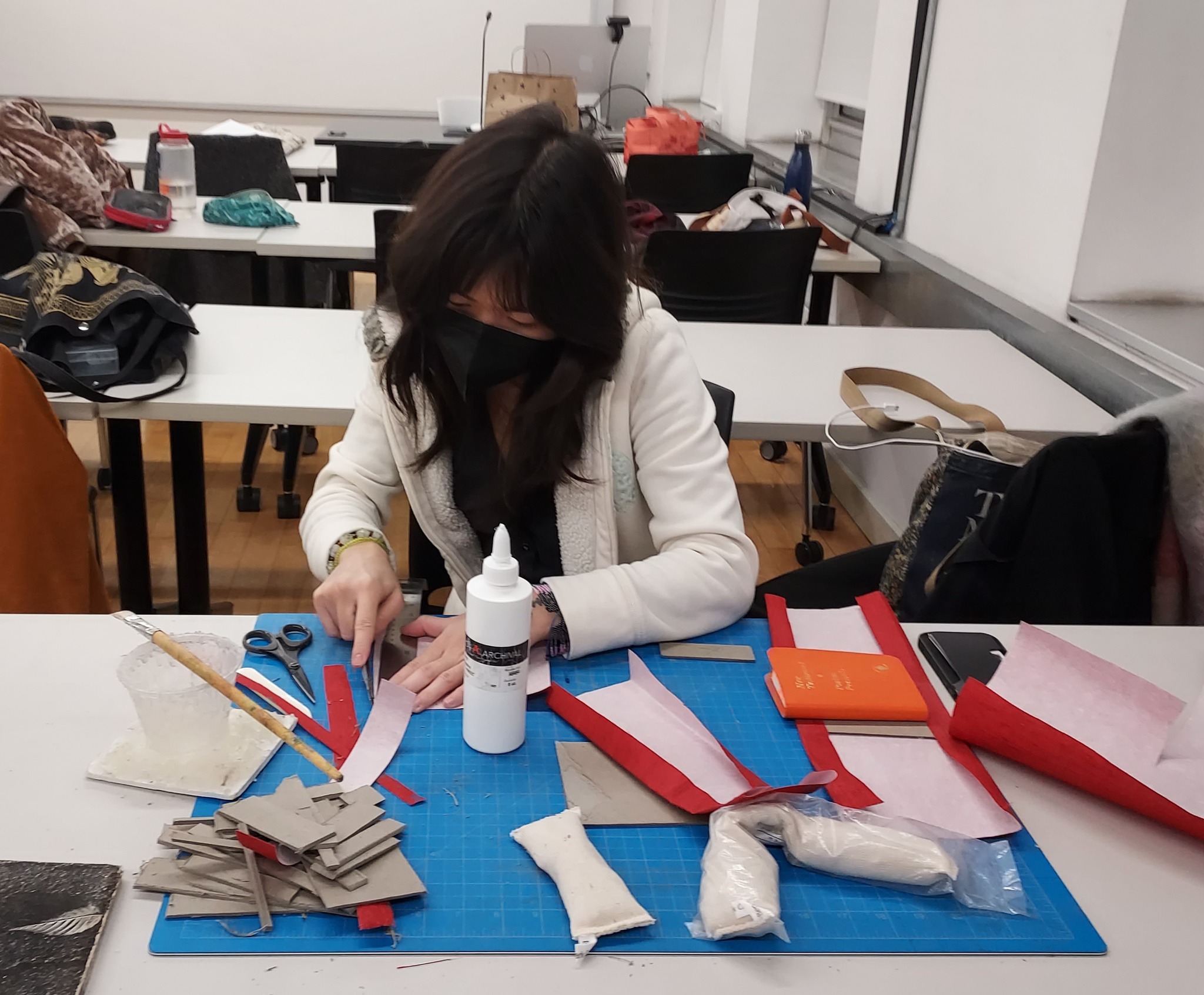 Students in Conservation Lab with Prof. Slava Polishchuk work on custom enclosures for rare books.