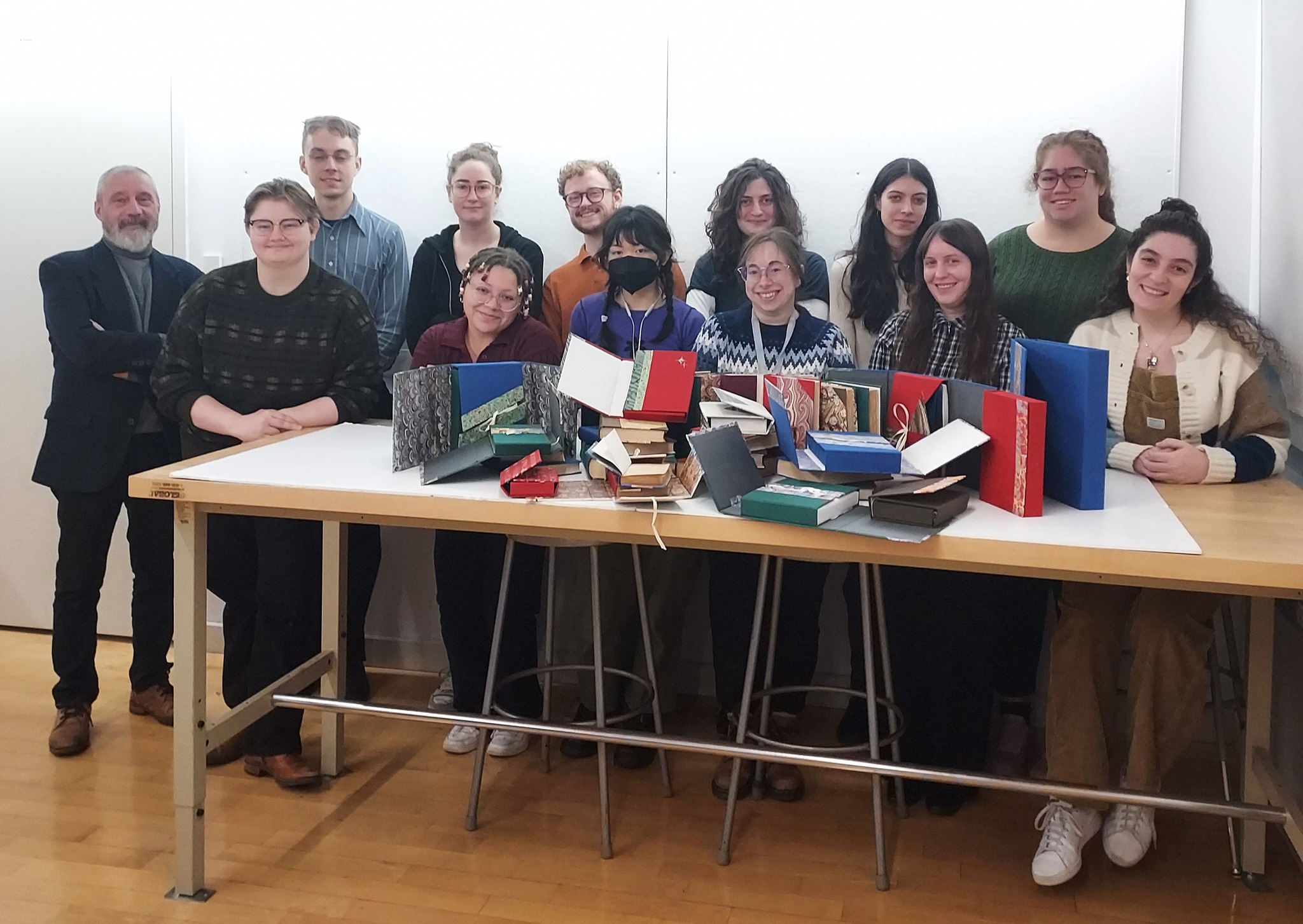 Students in Conservation Lab with Prof. Slava Polishchuk work on custom enclosures for rare books.